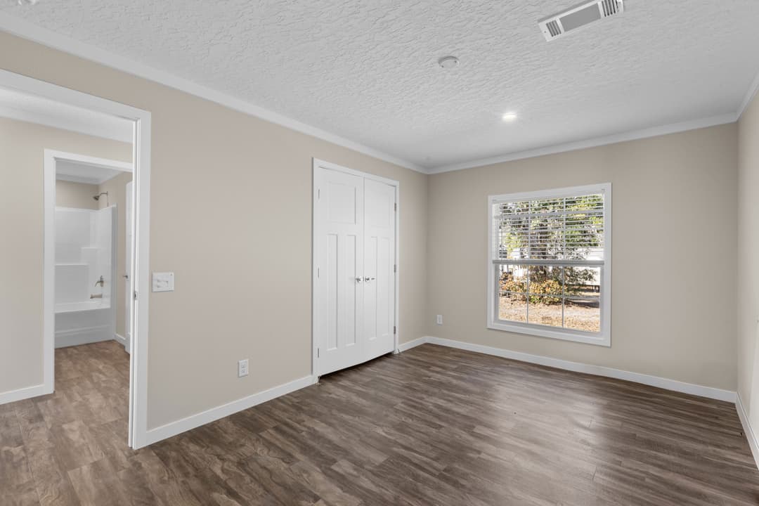 The merlin (inventory) bedroom home features